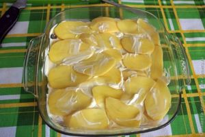Филе пангасиуса, запеченное с картофелем и сыром