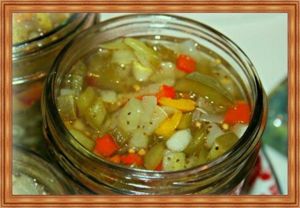 8. «Тушенка» из переросших огурцов на зиму. Продукты: Огурцы, помидоры, сладкий перец, морковь, лук, зелень, растительное масло, молотый перчик, соль. Количество продуктов и приправ можно варьировать по своему вкусу. Приготовление: большие огурцы очистить, разрезать на 4 части и вырезать серединку с семенами. Далее подготовленные ломтики нарезать кубиками, выложить в горячее масло на сковороду и обжарить до прозрачности. Остальные овощи обработать, нарезать кубиками или ломтиками, добавить к огурцам. По вкусу в овощную смесь добавить специи, тушить до готовности всех овощей. Смесь разложить в горячую тару, сразу же закатать крышками и укутать «тушенку» шубкой. 8. «Тушенка» из переросших огурцов на зиму. Продукты: Огурцы, помидоры, сладкий перец, морковь, лук, зелень, растительное масло, молотый перчик, соль. Количество продуктов и приправ можно варьировать по своему вкусу. Приготовление: большие огурцы очистить, разрезать на 4 части и вырезать серединку с семенами. Далее подготовленные ломтики нарезать кубиками, выложить в горячее масло на сковороду и обжарить до прозрачности. Остальные овощи обработать, нарезать кубиками или ломтиками, добавить к огурцам. По вкусу в овощную смесь добавить специи, тушить до готовности всех овощей. Смесь разложить в горячую тару, сразу же закатать крышками и укутать «тушенку» шубкой.
