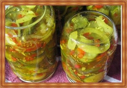 9. Салат, стерилизованный в баночках. Продукты: огурцы – 3 кг, укроп свежий – большой пучок, лук – 0.5 кг, растительное масло – 250 мл, соль – ¼ ст., уксус 6% — 250 мл, сахар — 0.5 ст. Приготовление: огурцы, очищенные от грубой кожуры, нарезать кружочками. Мелко порубить укроп. Лук нарезать кольцами. Разложить подготовленные овощи по баночкам слоями: огурцы, укроп, лук, огурцы и так далее. Из масла, соли, уксуса и сахара сделать холодную заливку, то есть кипятить смесь не нужно. Залить смесью салат, оставить часа на 3. Далее содержимое банок уплотнить, огурцы с луком из одной банки разложить по остальным, накрыть крышками и стерилизовать5 – 10 минут. Закатать. 9. Салат, стерилизованный в баночках. Продукты: огурцы – 3 кг, укроп свежий – большой пучок, лук – 0.5 кг, растительное масло – 250 мл, соль – ¼ ст., уксус 6% — 250 мл, сахар — 0.5 ст. Приготовление: огурцы, очищенные от грубой кожуры, нарезать кружочками. Мелко порубить укроп. Лук нарезать кольцами. Разложить подготовленные овощи по баночкам слоями: огурцы, укроп, лук, огурцы и так далее. Из масла, соли, уксуса и сахара сделать холодную заливку, то есть кипятить смесь не нужно. Залить смесью салат, оставить часа на 3. Далее содержимое банок уплотнить, огурцы с луком из одной банки разложить по остальным, накрыть крышками и стерилизовать5 – 10 минут. Закатать.