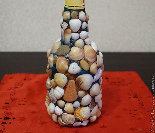 Бутылка с ракушками