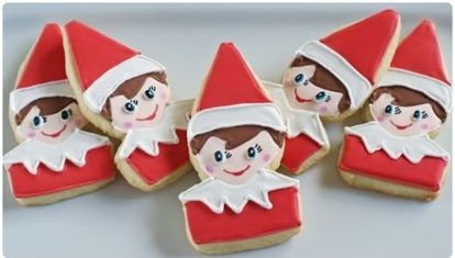 Печенье в виде маленьких помощников Деда Мороза - работа очень кропотливая, но ведь дети готовы на все ради новогодних подарков!