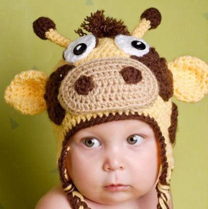 На мой взгляд, очень обаятельная и весёлая шапочка. Или это сказывается моя любовь к коровам)) А взгляд у ребёнка подходит форме головного убора!