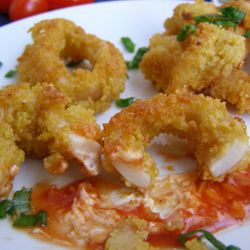 Сытная закуска из кальмаров в кляре по-испански