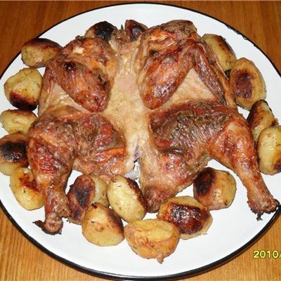 Курица в сметане, запеченная в духовке