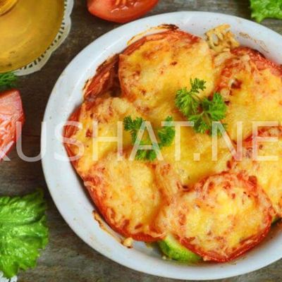 Кабачки, запеченные в духовке с помидорами и сыром