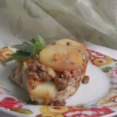 Картофельная запеканка под грибным соусом